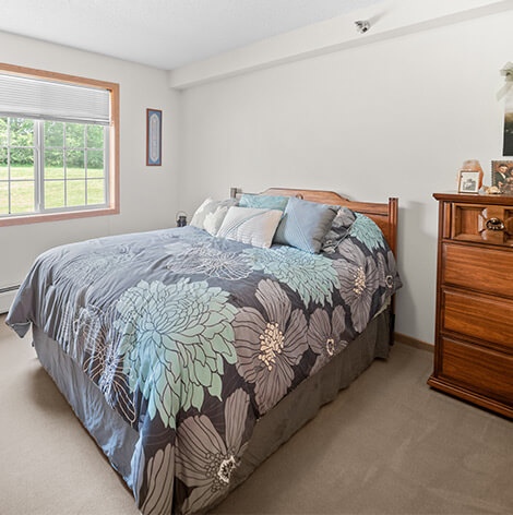 Independent living apartment bedroom at Good Samaritan Society - West Union.