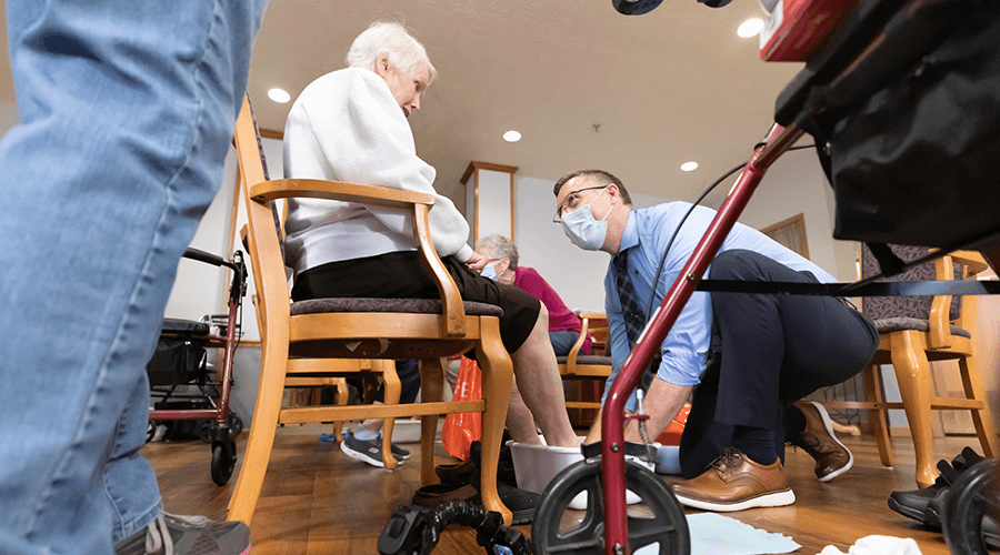 Samaritan’s Feet treats seniors to foot washing & footwear