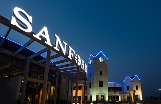 Sanford Center exterior sign at night.