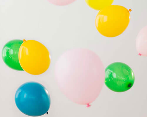 Balloons floating in the air.
