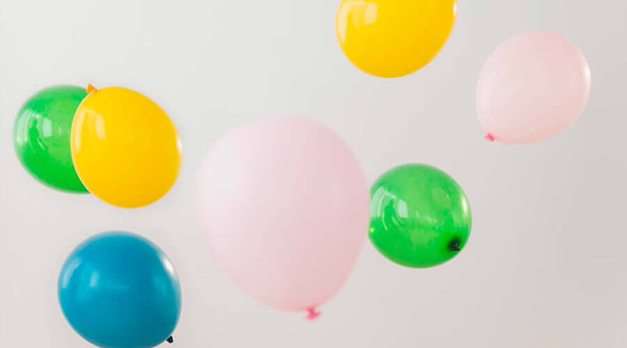 Balloons floating in the air.