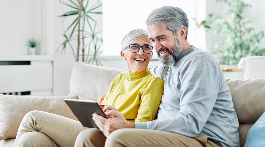 Couple using a tablet.