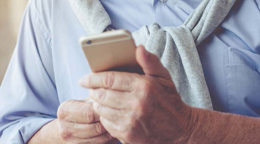 Man holding cell phone.