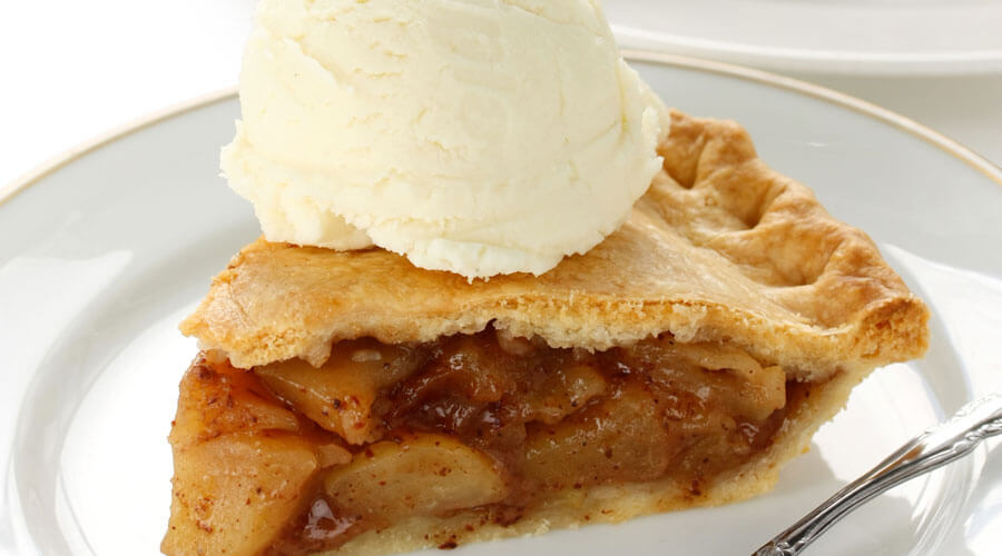 Pie with ice cream on top.