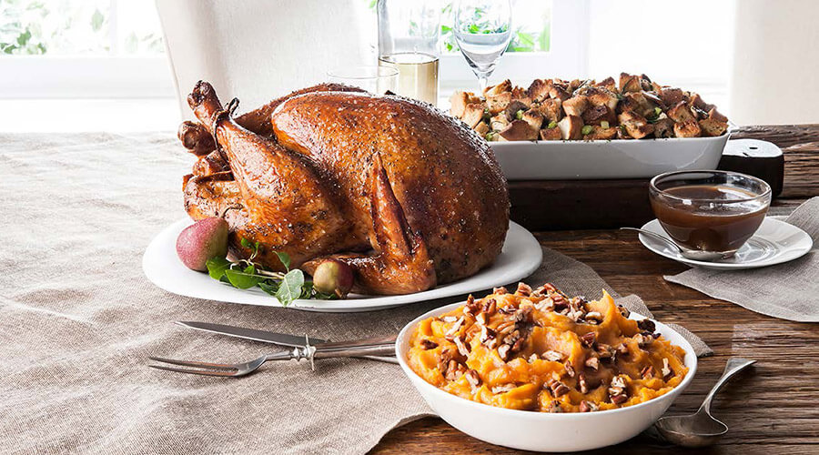 Thanksgiving feast table and food.