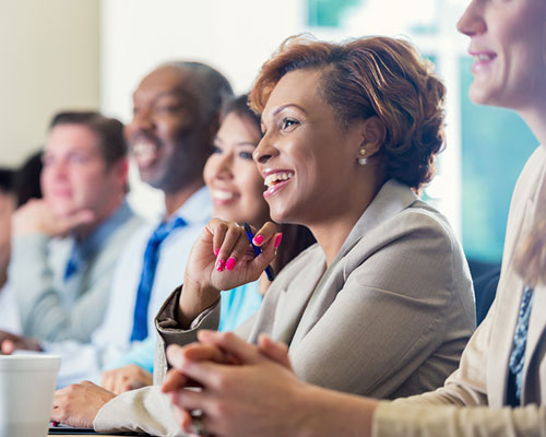 People listening to a presentation.
