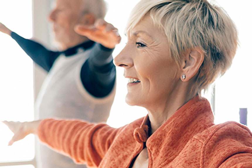 Two seniors balancing.
