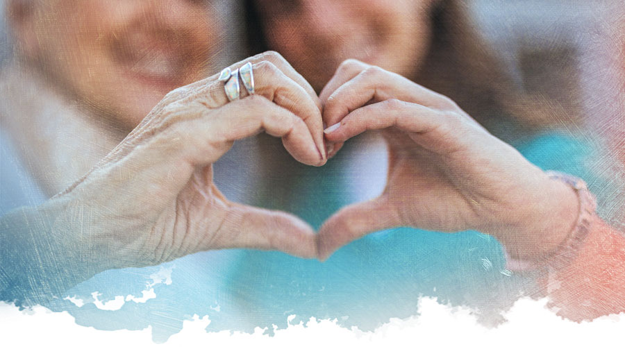 Two hands forming a heart.