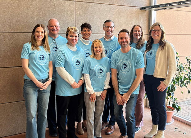 Sanford Health and Good Samaritan employees in their employee giving shirts.