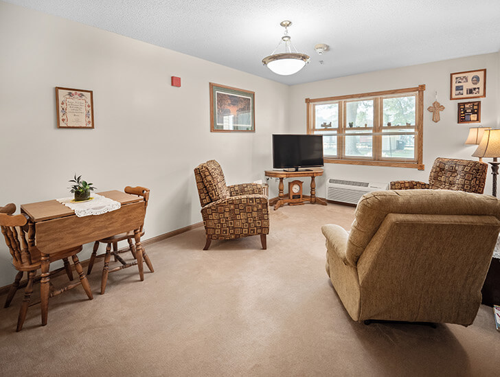 Assisted living apartment living room at Good Samaritan Society - Arlington