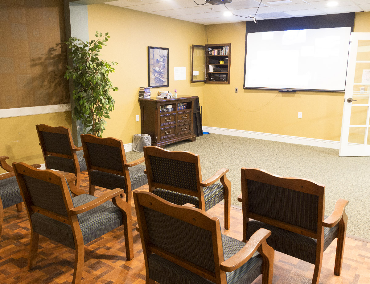 Enjoy the full movie experience with comfy chairs and a big screen at Good Samaritan Society - Augusta Place in Bismarck, North Dakota.