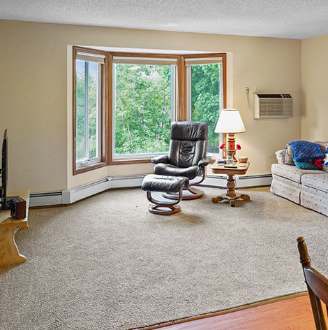 The living room in a 1 bedroom assisted living apartment at Good Samaritan Society - Woodland in Brainerd, MN.