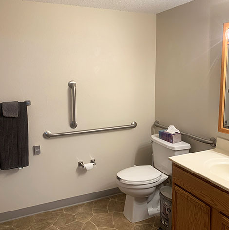 Independent living apartments feature spacious bathrooms with safety rails and walk-in shower at Good Samaritan Society - Hidewood Estates in Clear Lake, South Dakota.