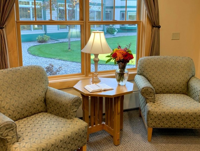 Comfortable seating area for friends, families and residents to connect at Good Samaritan Society - Heritage Grove in East Grand Forks, Minnesota.