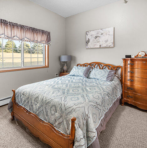 Assisted living bedroom at Good Samaritan Society - Edgebrook Care Center