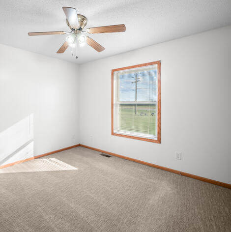 Good Samaritan Society - Ellsworth independent living fourplex bedroom.