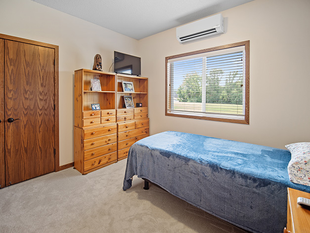 Assisted living apartment bedroom at the Lodge of Howard Lake in Howard Lake, Minnesota.