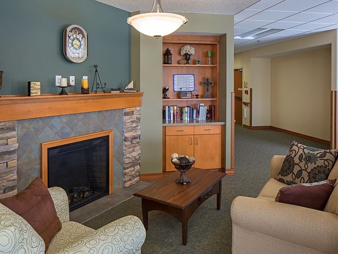 Cozy lounge area for residents and families to gather at Good Samaritan Society - Indianola in Indianola, IA.