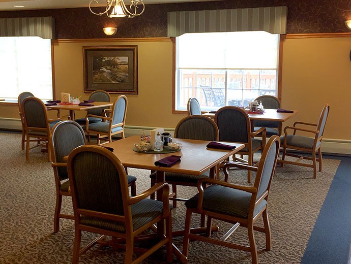 Comfortable community dining room for friends and residents to gather for a meal at Good Samaritan Society - Indianola in Indianola, IA.