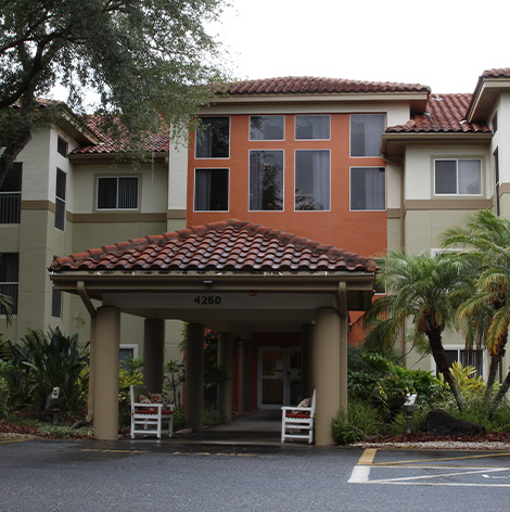 Main entrance for independent living residents at Village West at Good Samaritan Society - Kissimmee Village in Kissimmee, Florida.
