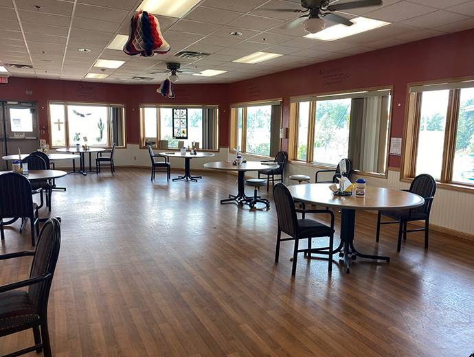 The community dining room offers a space for gathering and natural light as you enjoy your meal at Good Samaritan Society - Lakota in North Dakota.