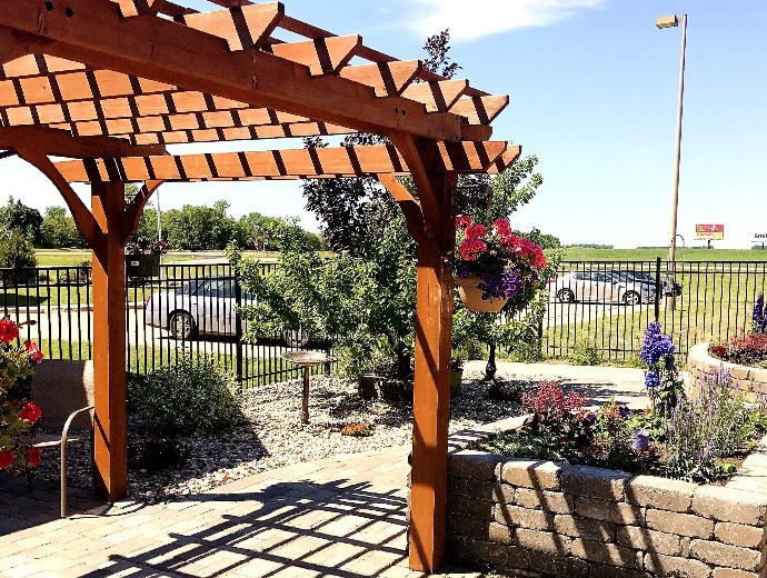 The senior living campus features a beautiful garden to enjoy the outdoors at Good Samaritan Society - Lakota in North Dakota.