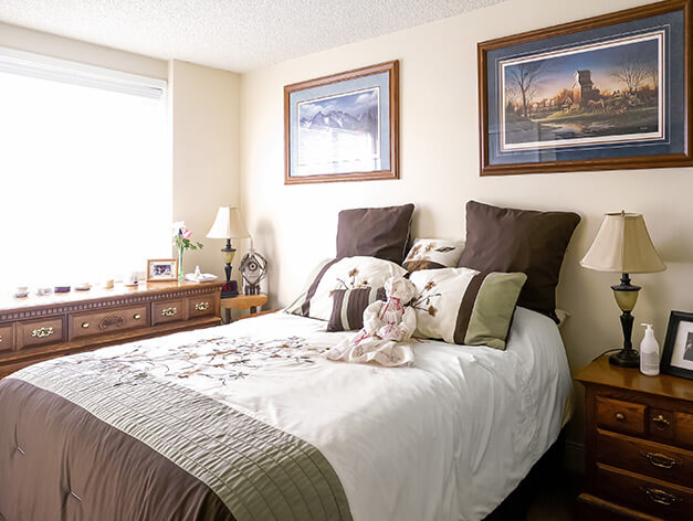 Bedroom in an assisted living apartment at Good Samaritan Society - Loveland