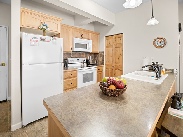 Independent Living apartment kitchen at Good Samaritan Society - Loveland Village in Colorado.