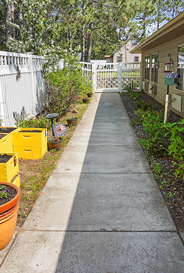Assisted living patio and garden at Good Samaritan Society - Pine River