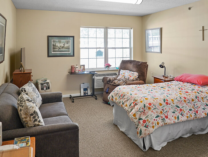 Assisted living studio apartment and garden at Good Samaritan Society - Pine River