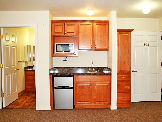 Two-bedroom assisted living apartments feature kitchenette at Good Samaritan Society - Willow Wind in Prescott, Arizona