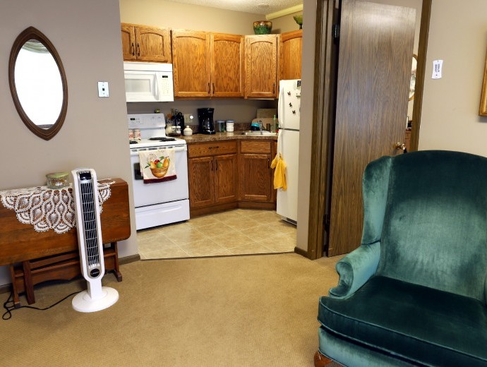 Assisted living apartment living room and kitchen Good Samaritan Society - Sioux Falls Village in Sioux Falls, South Dakota.