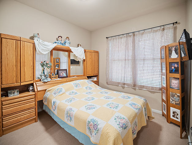 Bedroom of an assisted living apartment at Good Samaritan Society - Sioux Falls Village