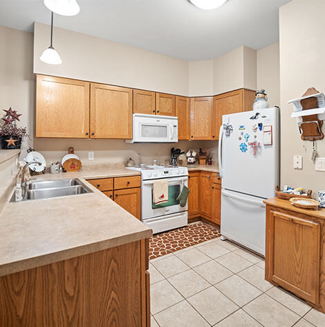 Kitchen of an assisted living apartment at Good Samaritan Society - Sioux Falls Village
