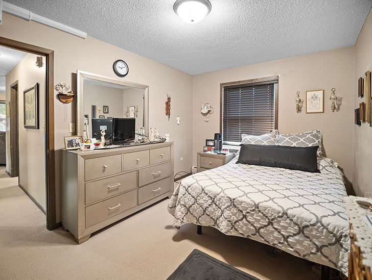 Gardenstone independent living apartment bedroom at Good Samaritan Society - Sioux Falls Village