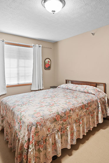 Bedroom of Meadowstone independent living apartment at Good Samaritan Society - Sioux Falls Vilalge