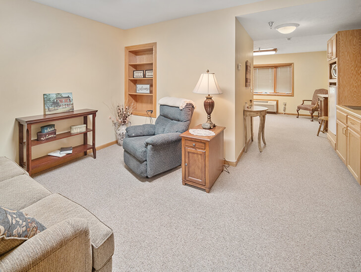 Victorian Legacy assisted living apartment living room at Good Samaritan Society - Superior