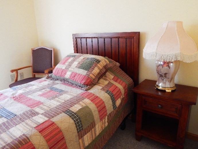 Victorian Legacy assisted living apartment bedroom
