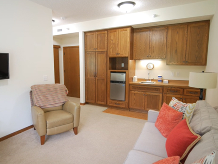 Assisted living apartment living room at The Lodge of Taylors Falls by Good Samaritan Society 