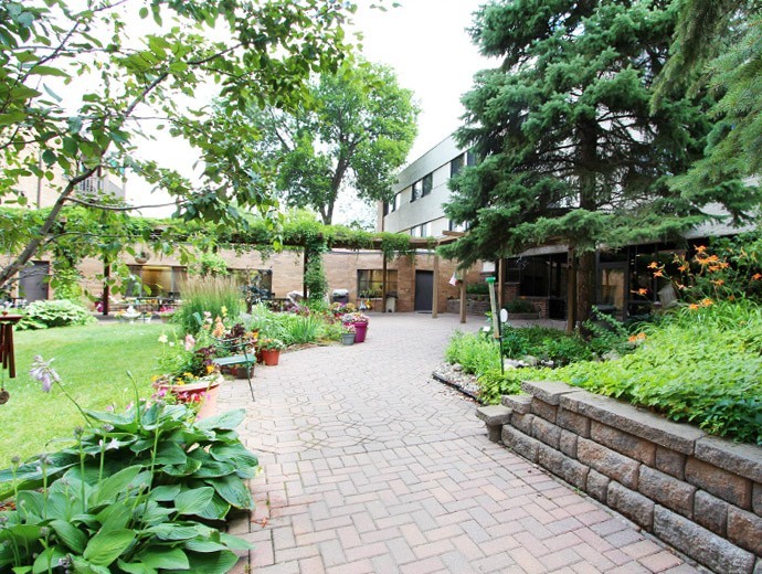 Walking paths promote wellness and lead to the courtyard for residents at Good Samaritan Society - Waconia in Waconia, Minnesota.