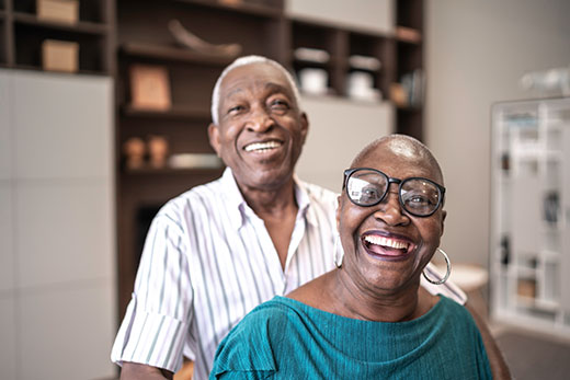 Couple laughing.