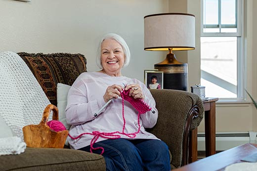 Woman knitting.