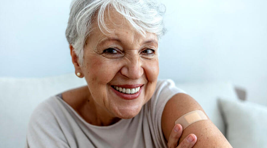 Woman with band-aid on arm