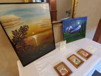 Table of art at the art fair.