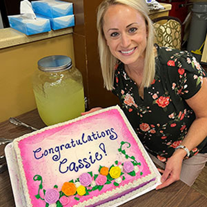 Good Samaritan Society - International Falls Occupational Therapist, Cassie Thompson, is being celebrated with cake for her nomination for a Guardian Angel award