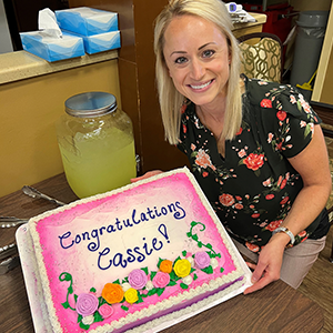 Good Samaritan Society - International Falls Occupational Therapist, Cassie Thompson, is being celebrated with cake for her nomination for a Guardian Angel award