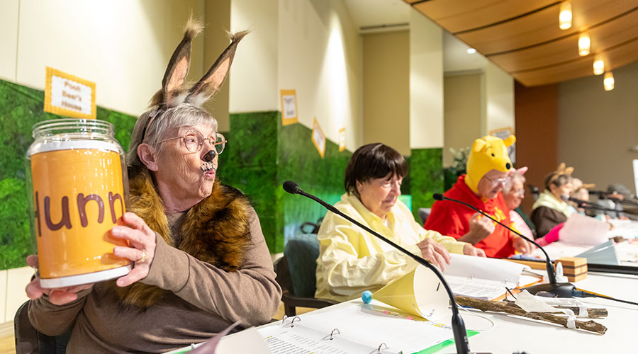 Rae Ellen Hinken, playing the role of Rabbit, performs with other members of the Act Your Age theater group at Good Samaritan Society - Cedar Lake Village in Olathe, Kansas.