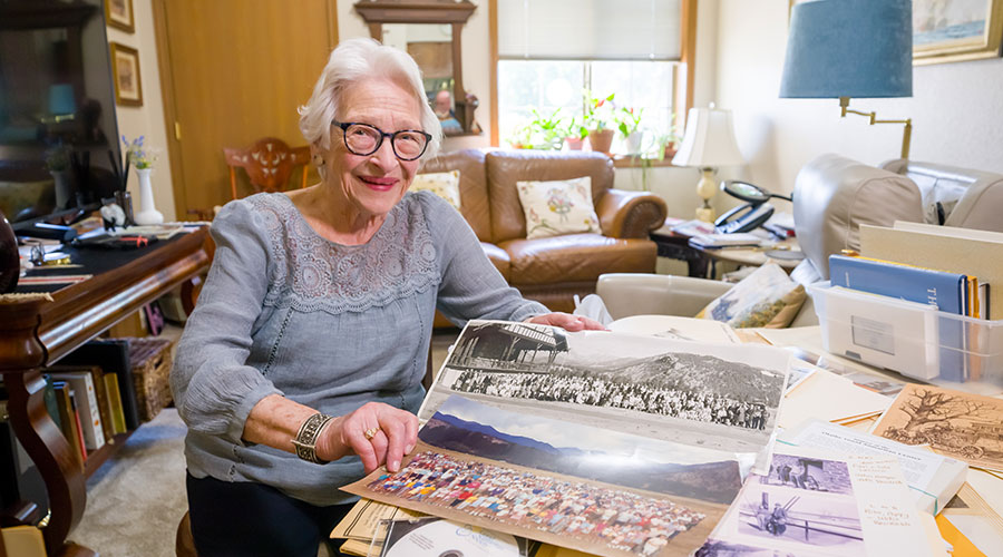 101-year-old Ruth Ann Hackler of Good Samaritan — Cedar Lake Village holding family photos