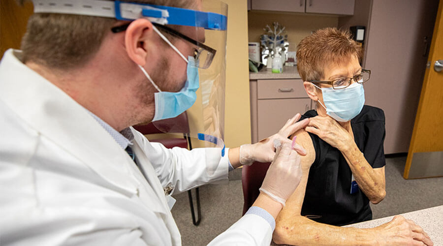 Vaccination rates high, COVID-19 numbers low at Society