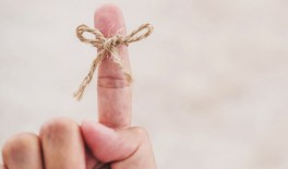 String tied around finger to help someone remember something